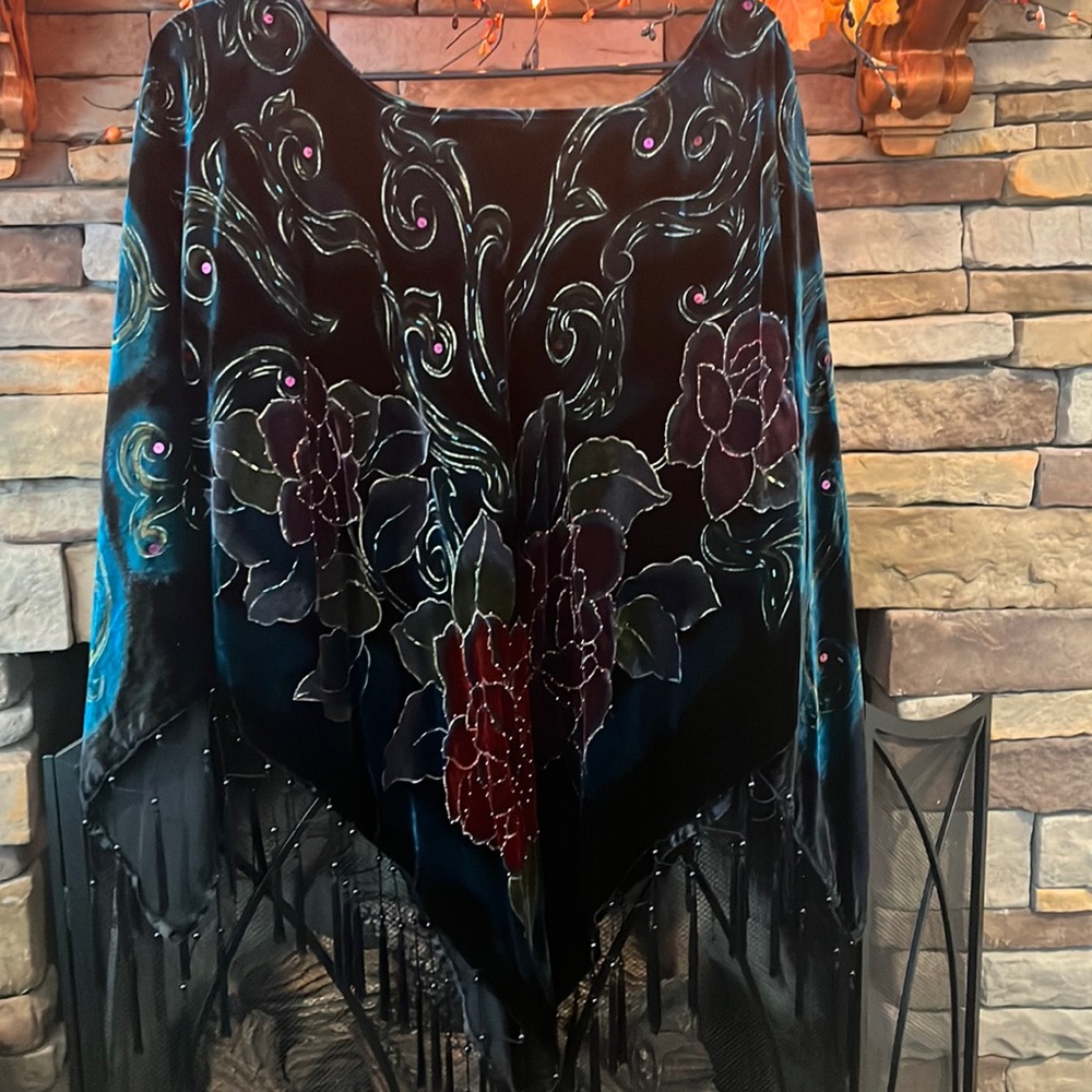 Black velvet embellished poncho.